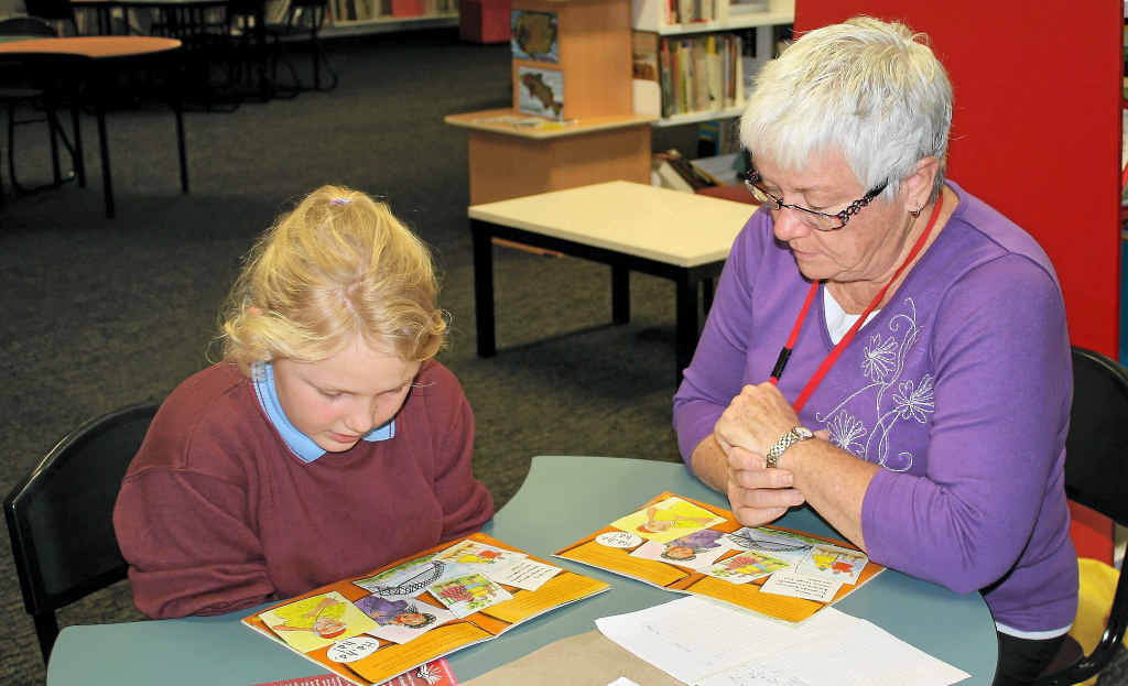 Kaitlyn Zimmerle with Ready Readers volunteer Michele Slater.